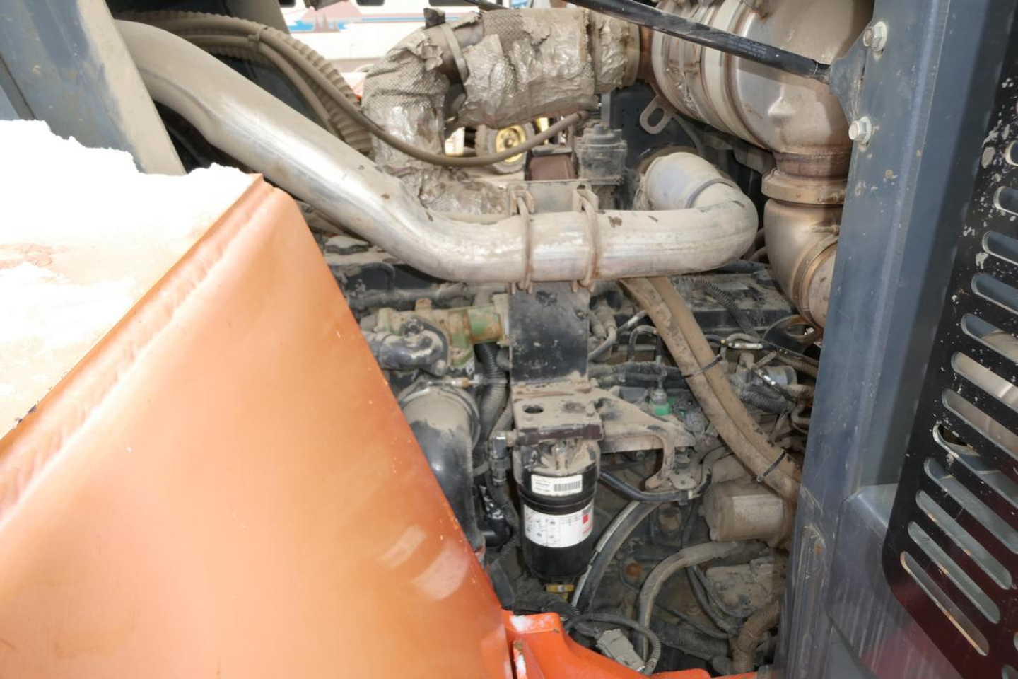 Engine bay view of 2018 Toyota THD3000-24 trucking equipment with exposed hoses, pipes, and a filter canister.