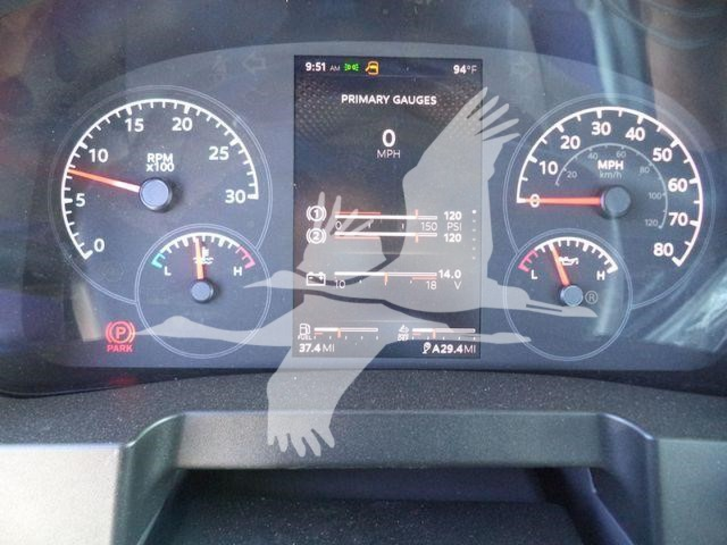 Kenworth T680 dash display showing gauges and digital screen with 0 mph and various indicators.
