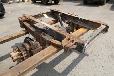  Ford LCF frame chassis with rusted steel and rear differential/brake components visible