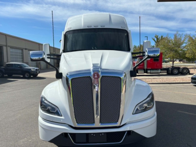 Kenworth T680 truck front view showing chrome grille and headlights.