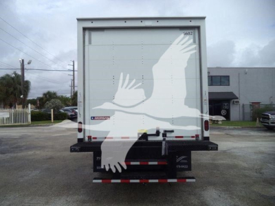 Box truck rear showing Morgan dry van with back doors, bumper, and rear reflective tape.