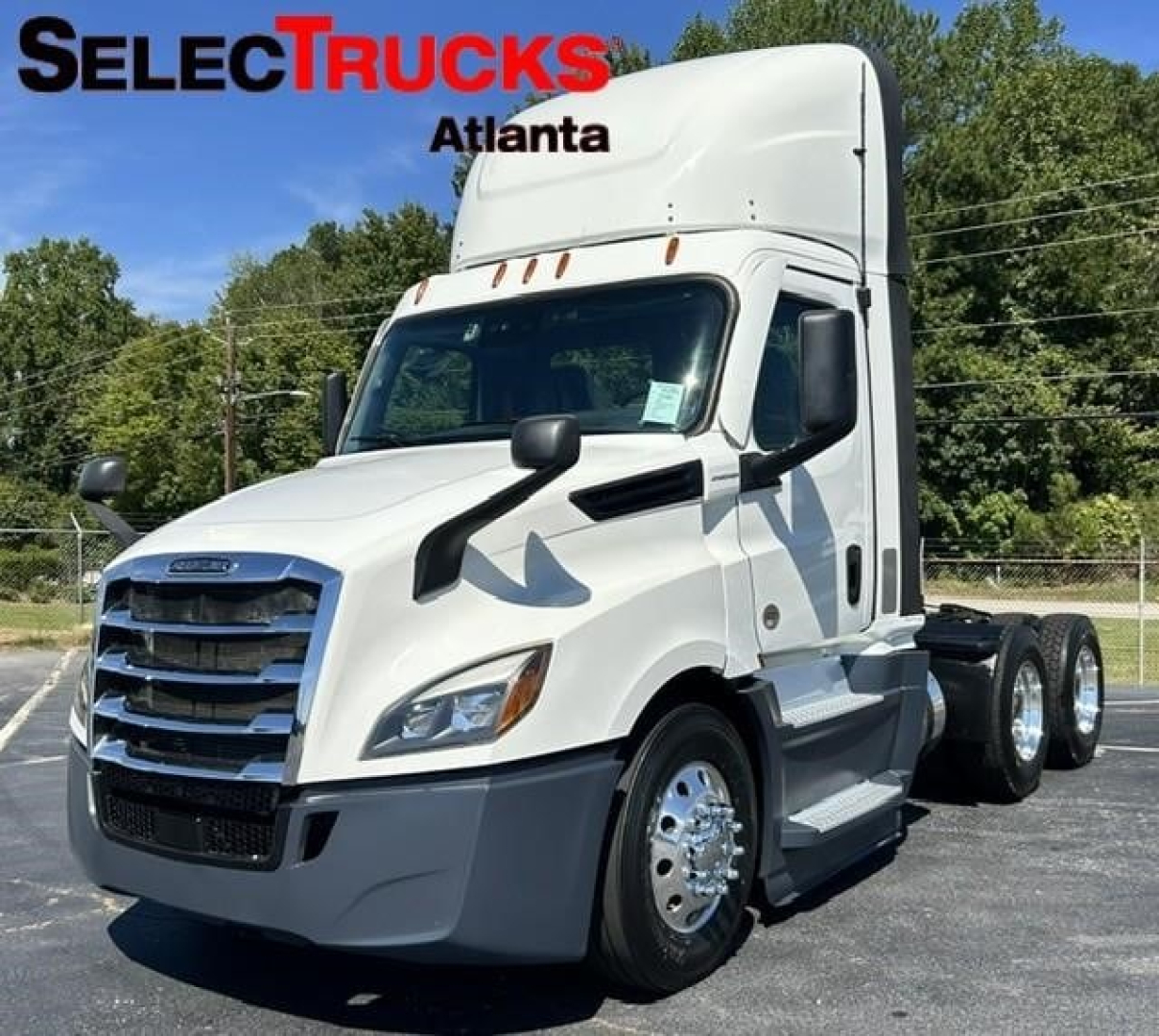 Freightliner Cascadia 126 day cab truck in white, front three-quarter view with SelectTrucks Atlanta branding overlay.