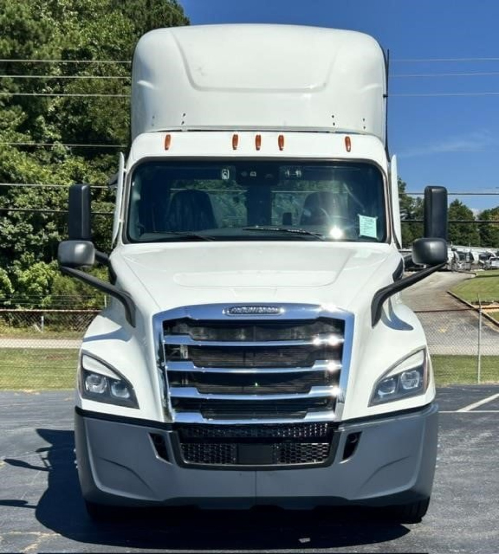 Freightliner Cascadia 126 day cab front view showing large grille, headlights, and mirrors.