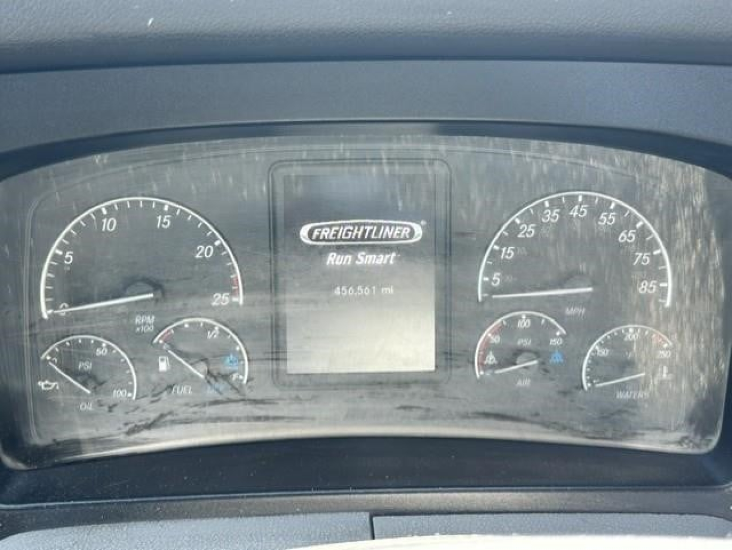 Freightliner Cascadia dashboard showing gauges and center display.