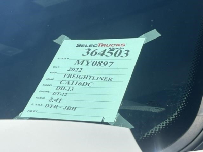 Truck window sticker showing stock 364503, MY0897, 2022 Freightliner Cascadia DL-B-13 engine DT-12, 241 wheelbase, with text "SelectTrucks" on tag.