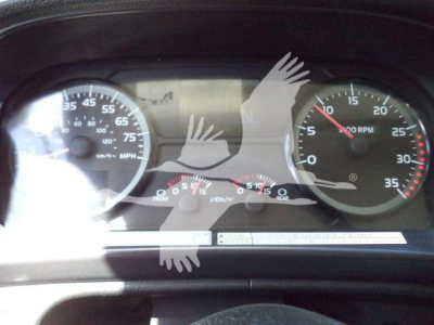 Dashboard of a 2015 Hino 268A refrigerated truck showing speedometer, tachometer, and instrument cluster with digital display in center.