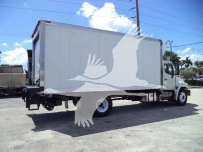 Box truck with refrigerated cargo body and a white cab, side view, no visible branding.
