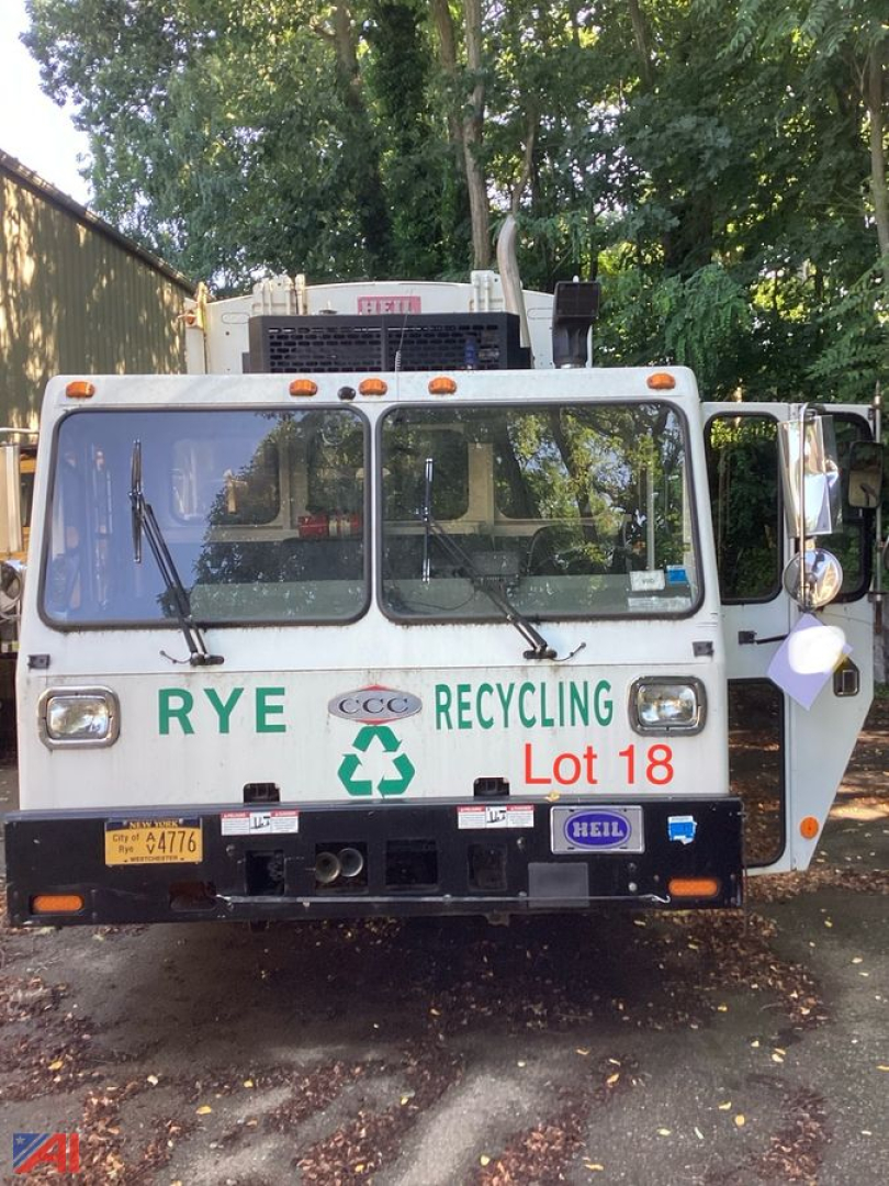 Crane Carrier low-entry cab-over engine truck front view showing ‘RYE RECYCLING’ text, Lot 18, and CDL-style cab with large windshield wipers.