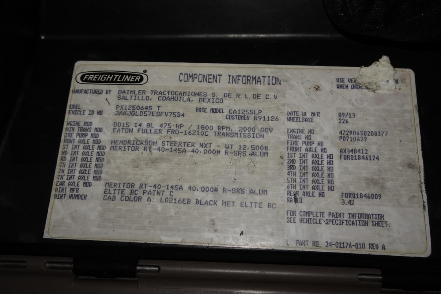 Freightliner component information plate with VIN 3AKJGLD57ESFV7534 and various specs including engine, axles, and rims. visible text includes 'FREIGHTLINER', 'COMPONENT INFORMATION', 'VIN 3AKJGLD57ESFV7534', 'STOCK NUMBER 1228231', 'DELIVE