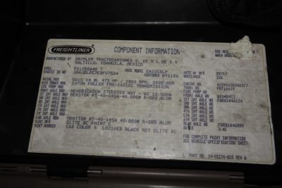 Freightliner component information plate with VIN 3AKJGLD57ESFV7534 and various specs including engine, axles, and rims. visible text includes 'FREIGHTLINER', 'COMPONENT INFORMATION', 'VIN 3AKJGLD57ESFV7534', 'STOCK NUMBER 1228231', 'DELIVE