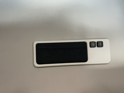 Volvo VNL64T860 interior overhead console with small control buttons and ambient light panel.