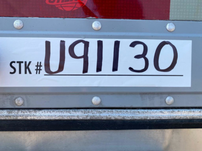 Stock number plate showing STK # U91130 for a 2021 Utility Reefer trailer.