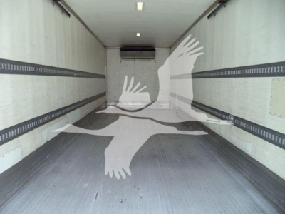 Interior of a Freightliner M2 106 box truck cargo area showing empty trailer with rubber flooring and side E-track rails.