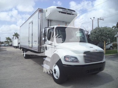 Freightliner M2 106 box truck with Thermo King reefer unit mounted on cab, side view showing cargo box and front grille.
