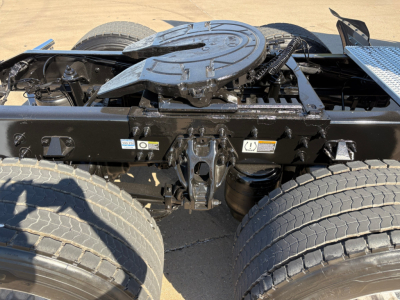 Peterbilt truck front chassis with dual rear axles and fifth wheel mount, view of tractor frame and fifth wheel on a 2022 Peterbilt 579.