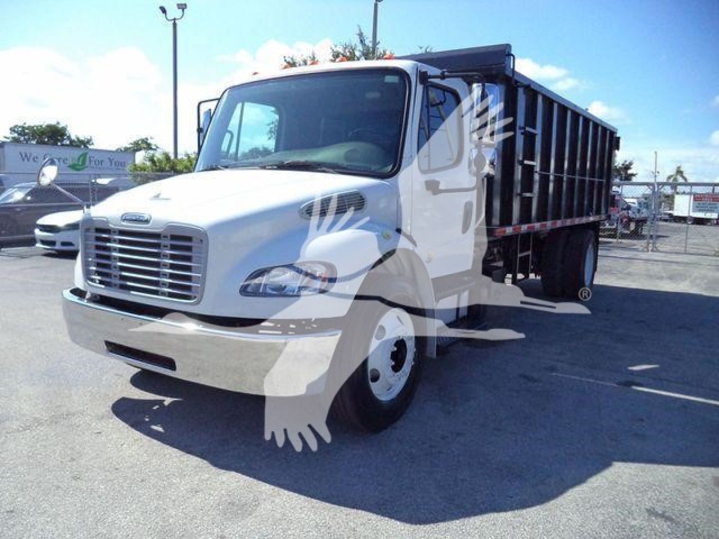Freightliner M2 106 dump truck in front view showing cab and dump bed with stock number THY4750FM.