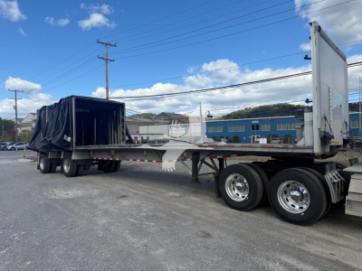 Trailer shows a 2006 Reitnouer Maxmiser curtainside trailer with a detachable cab and dual rear axles; VIN 1RNF48A286R016266 visible; stock PC-8724.