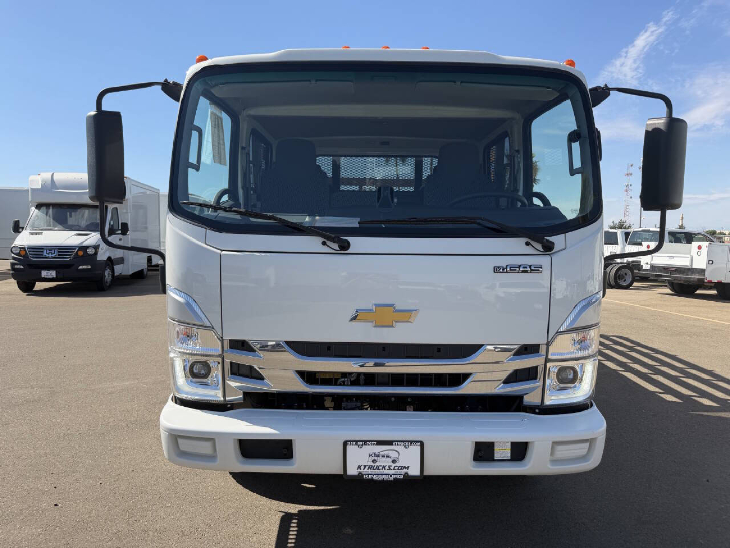 Front view of a 2024 Chevrolet 4500 LFC truck showing chrome grille, Chevrolet emblem, large windshield, and headlights.