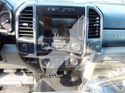 Dashboard of 2022 Ford F600 truck showing center infotainment display and climate controls.