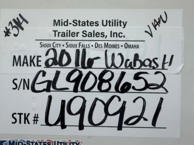 Tag showing Mid-States Utility Trailer Sales info for a 2016 Wabash van with handwritten VIN and S/N, stock U90921, S/N GL908652, STK U90921.