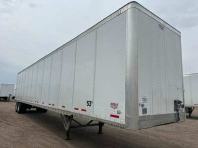 Trailer: 2016 Wabash van semi-trailer with 53' length, side-view showing riveted aluminum panels and rear doors.