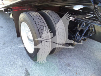 Peterbilt 337 rollback truck rear dual wheels and suspension view showing tires and chassis label