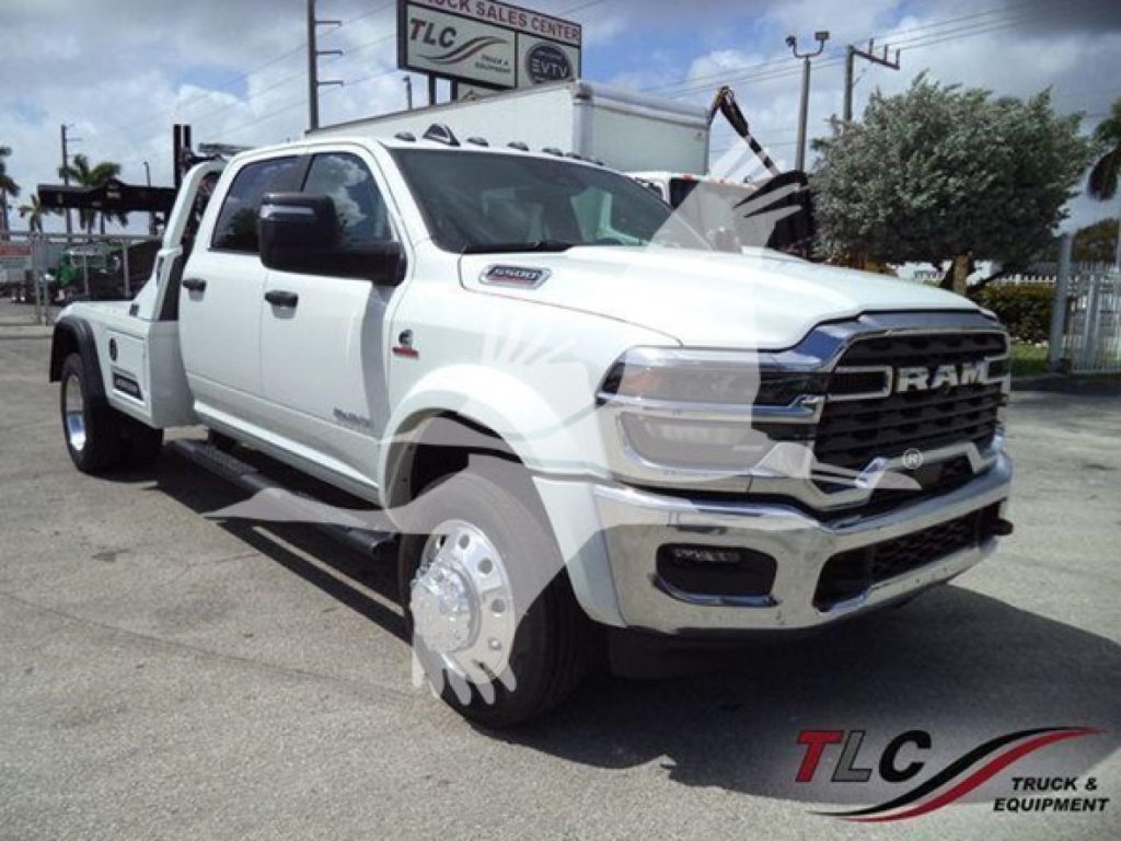 Ram truck in white with large cruiser front, badges and RAM grille, winch category listing, VIN 3C7WRNEL0TG225599 visible.