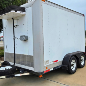 Isuzu refrigerated box truck trailer with dual rear wheels, white aluminum siding, diamond plate rocker panel, spare tire mounted on front, and plug-in refrigeration unit at front left.
