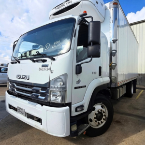 Isuzu FTR refrigerated truck cab and box with Thermo King refrigeration unit visible on top.