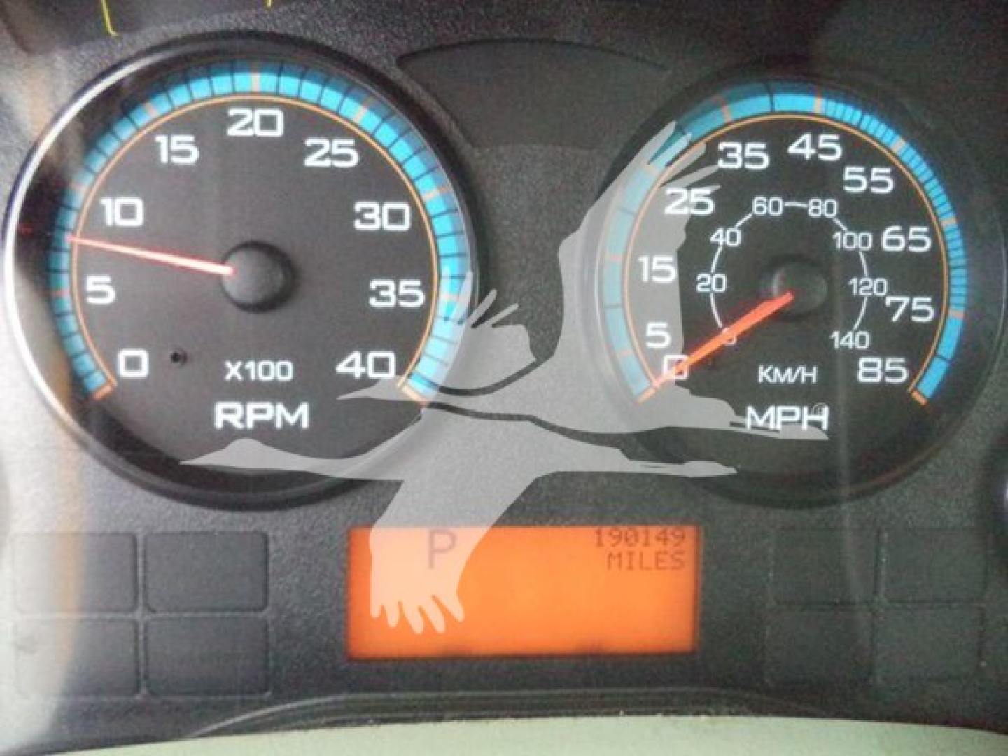 Dashboard of a 2018 International Durastar 4300 showing RPM gauge and speedometer with orange odometer display.