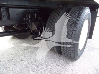 Truck rear dual wheels view undercarriage showing suspension and axle 3HAMMMML4JL446539 on VIN label?