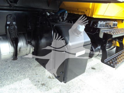 Truck fuel tank and underbody components of a 2018 International Durastar 4300 in a box truck configuration.