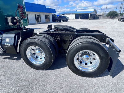 Kenworth W900L rear chassis with dual rear wheels and chrome wheels, rear fender and drivetrain area visible