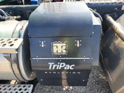 Kenworth truck component with TriPac Evolution and Thermo King logo on the unit.