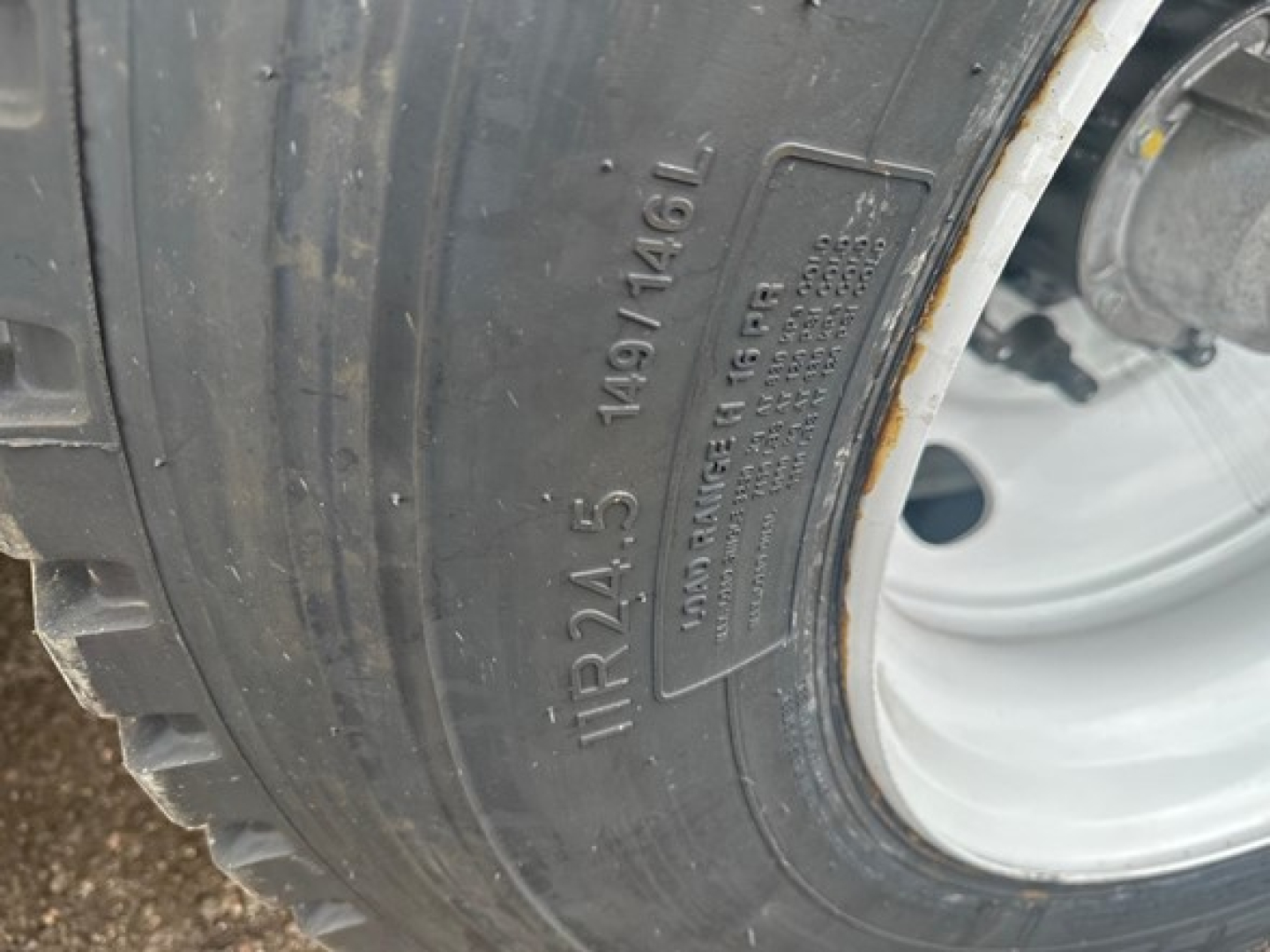 Ranco LW21-40-3 trailer tire sidewall showing tire size TR24.5 and serial-like markings.