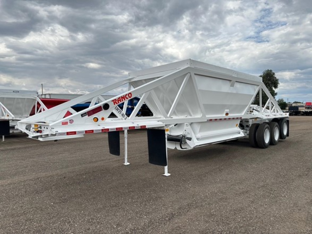 Ranco LW21-40-3 dump trailer shown in side view with white framed structure and dual rear axles.