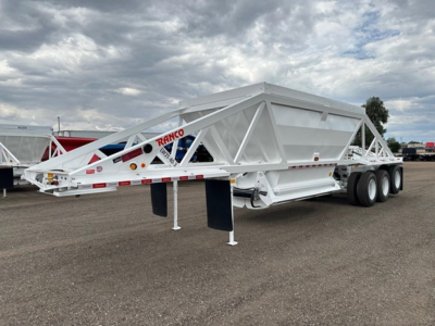 Ranco LW21-40-3 dump trailer shown in side view with white framed structure and dual rear axles.