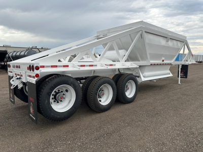 Ranco LW21-40-3 dump trailer in white with tri-axle configuration and lattice side panels. Visible text on mudflap and frame not legible; no identifying labels clearly readable.