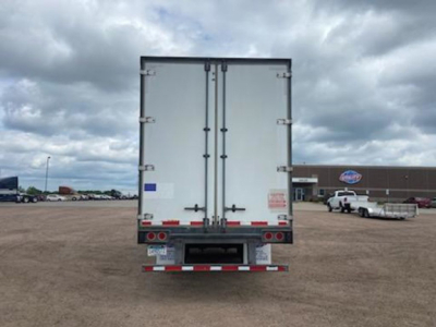Rear view of 2014 Stoughton van trailer showing dual rear doors and reflective safety markings.