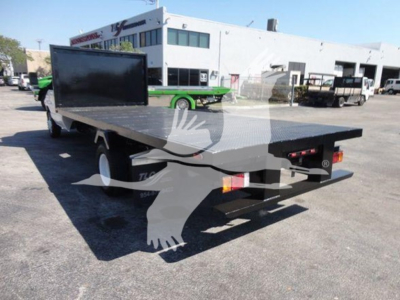 Flatbed truck showing open bed on 2011 Ford E450 with rear view, VIN 1FDXE4FS3BDB20639, stock T20639.
