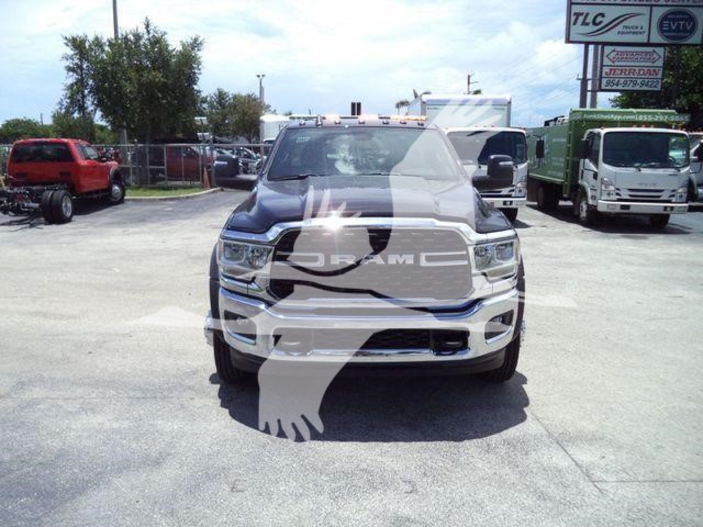 Ram 5500 SLT front view showing grille badge and bumper in a dealership lot