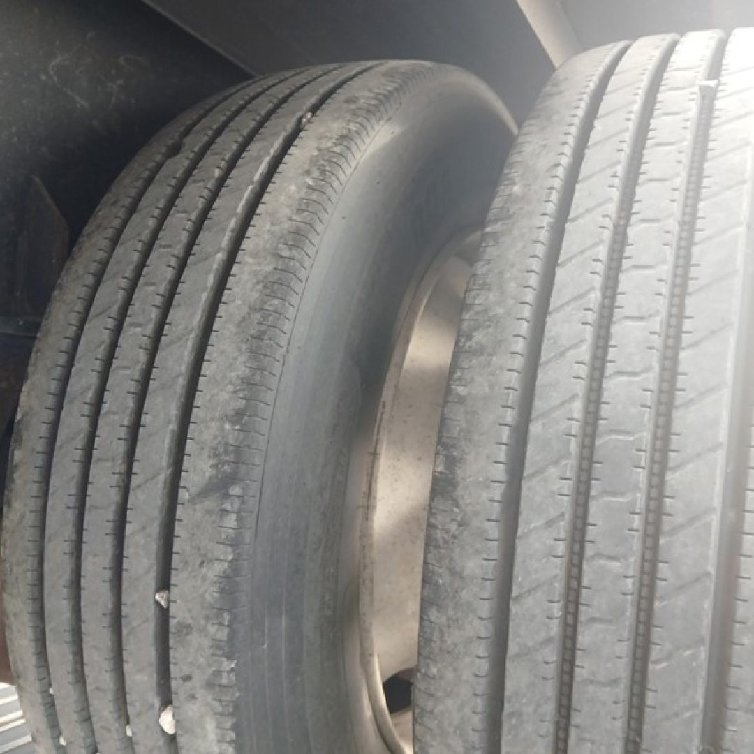Dual rear tires of a 2017 Manac Cal Legal Combo Drop Deck trailer showing tread and wheel hub.