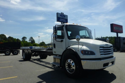 Freightliner M2 106 Plus cab and chassis showing white truck front with chassis exposed and VIN 3ALACWFC1VDXE3040 on listing.