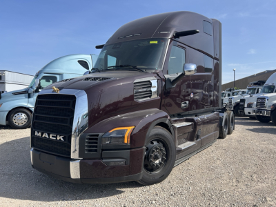 Mack PR64T76H conventional sleeper truck in dark maroon, side view, with stepped cab and chrome accents.