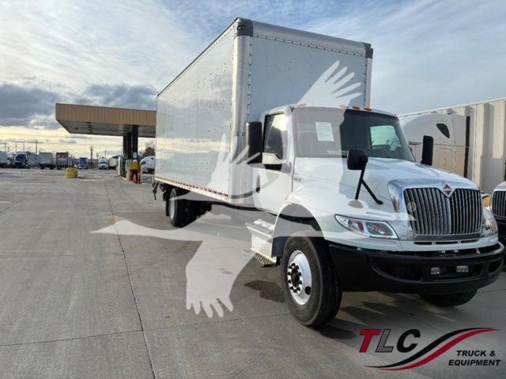 Box truck 2021 International MV side angle showing cab and cargo box with watermark bird graphic
