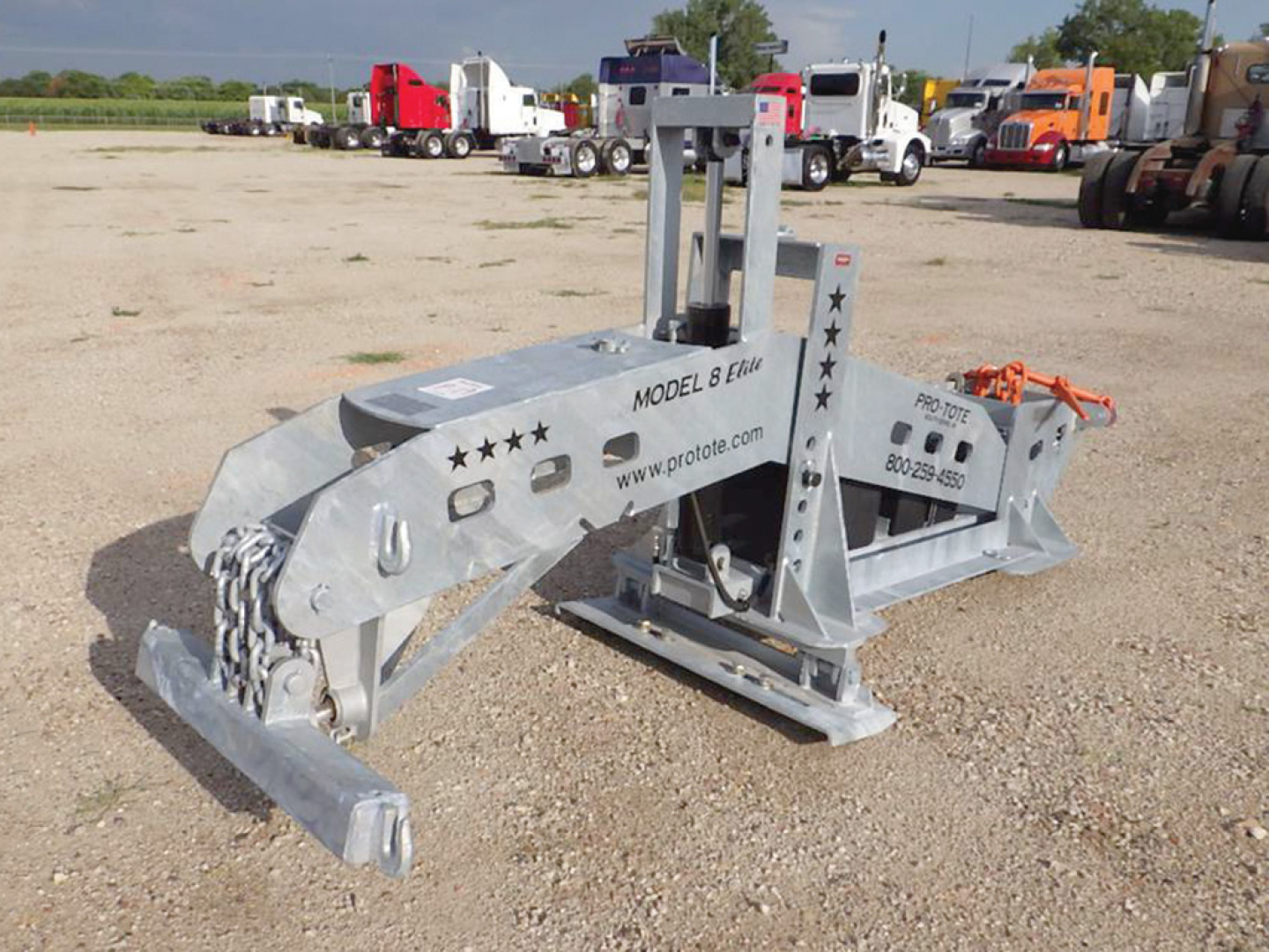 Pro-Tote 8 Elite hydraulic fifth wheel wrecker chassis showing Model 8 Elite lettering and chain hooks.
