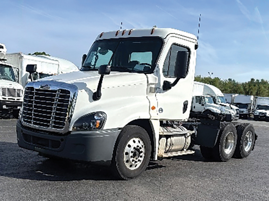 2019 Freightliner Cascadia125 conventional daycab truck front-left view showing cab and chassis with wheelbase and dual rear axles.