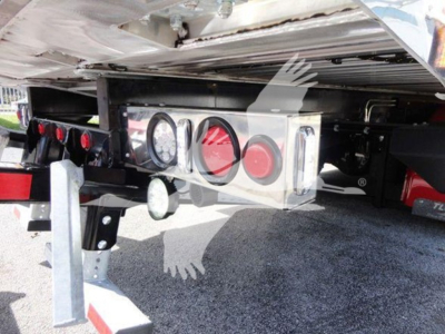 Peterbilt 337 rollback rear undercarriage showing taillight assembly and hitch components