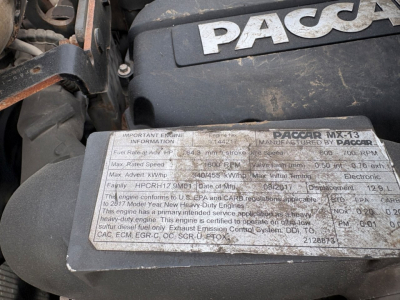 Kenworth Pacar MX-13 engine badge and label with engine information plate in view.