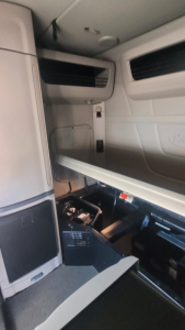 Peterbilt 579 truck cab interior view showing sleeper area and overhead vents
